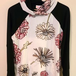 Amber hoodie with flowers and black accents 😍